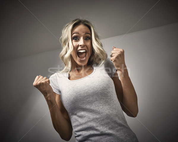 Stock photo: Young happy laughing girl portrait.