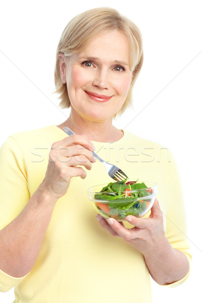 ストックフォト: 女性 · 食べ · サラダ · 成熟した · 笑顔の女性 · 果物