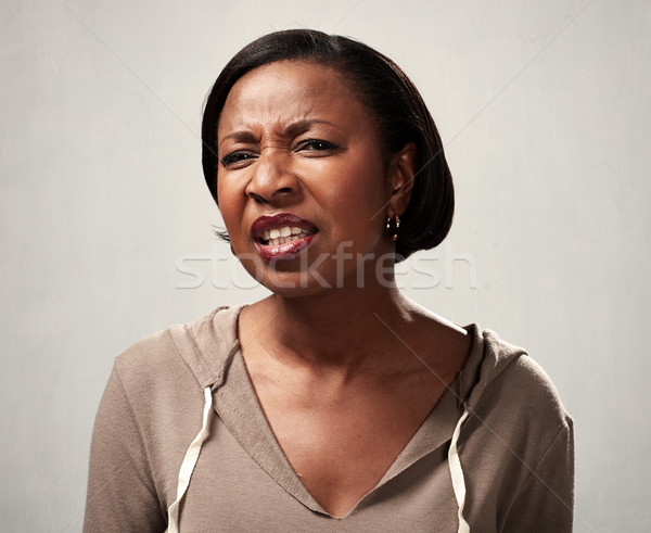 Stock photo: African woman incomprehension
