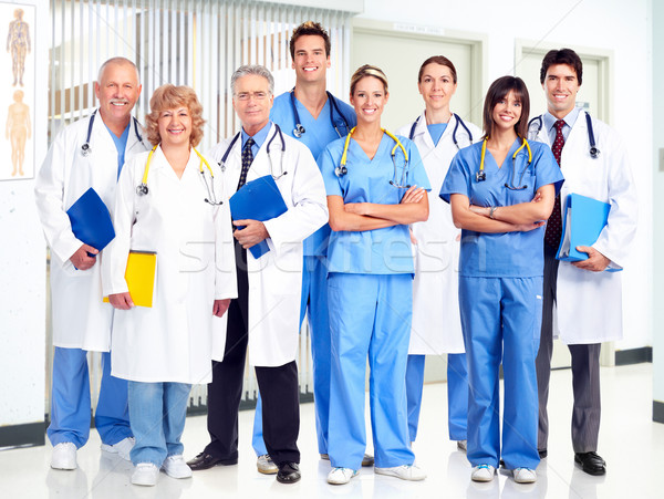 Médecins groupe souriant médicaux homme [[stock_photo]] © Kurhan