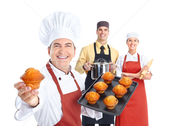 Stock photo: Chef group. Cooking.