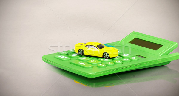 Yellow car and calculator. Stock photo © Kurhan