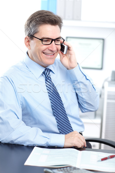 Człowiek biznesu dojrzały uśmiechnięty nowoczesne biuro działalności Zdjęcia stock © Kurhan
