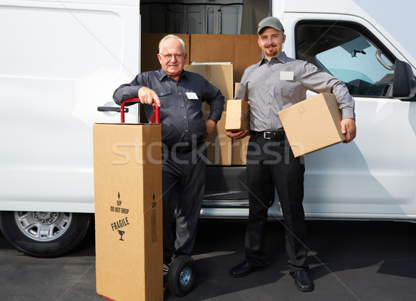 Entrega homens carga caminhão postar serviço Foto stock © Kurhan