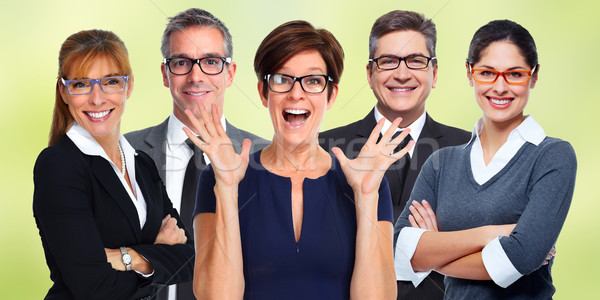 Stock photo: Group of business people wearing eyeglasses.