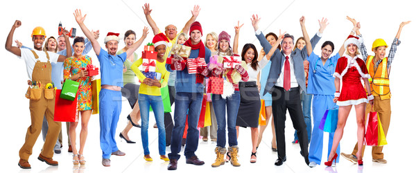 Group of happy Christmas people with gifts. Stock photo © Kurhan