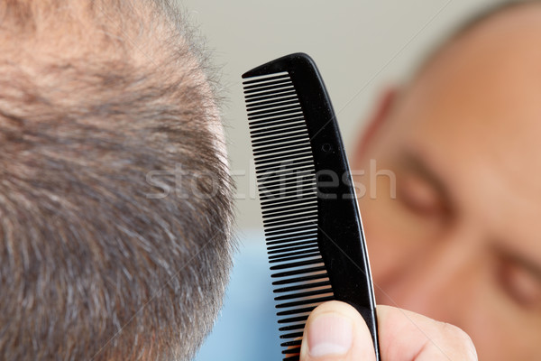 Man head with a comb. Stock photo © Kurhan