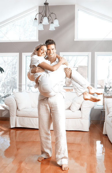 Happy couple at home. Stock photo © Kurhan