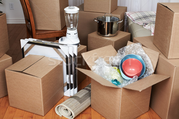 Moving boxes in new house. Stock photo © Kurhan