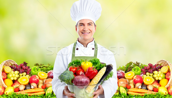Stock photo: Chef man with vegetables.