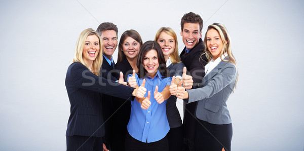 Grup fericit oameni de afaceri albastru student fundal Imagine de stoc © Kurhan