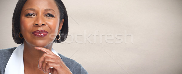 üzletasszony afro amerikai arc szürke fal Stock fotó © Kurhan