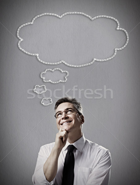 Thinking businessman. Stock photo © Kurhan