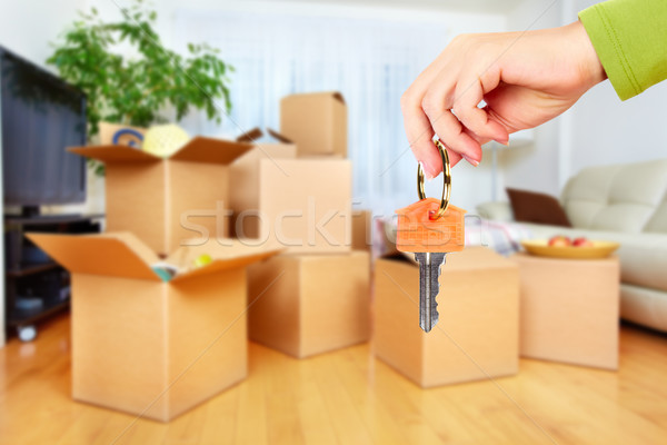 Stock photo: Hand with house key.
