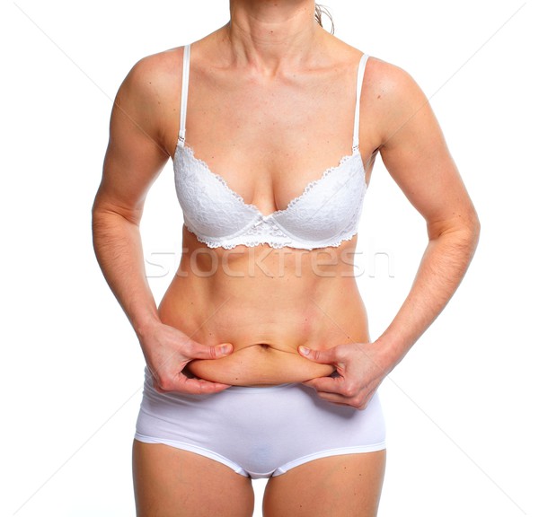 Stock photo: Woman fat belly.