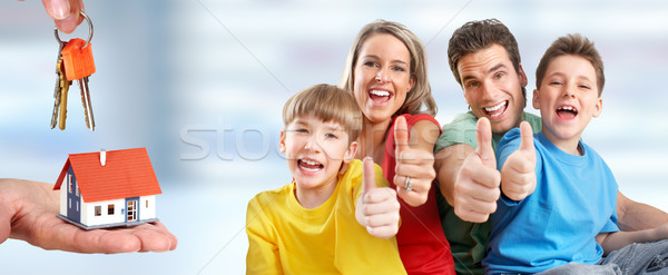 Happy family and little house. Stock photo © Kurhan