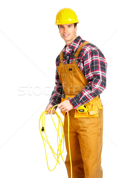 Eletricista jovem bonito amarelo uniforme branco Foto stock © Kurhan