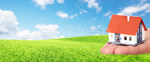 Hand with a little house. Stock photo © Kurhan