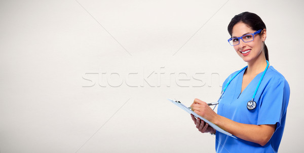 Médicaux médecin écrit ordonnance infirmière femme Photo stock © Kurhan