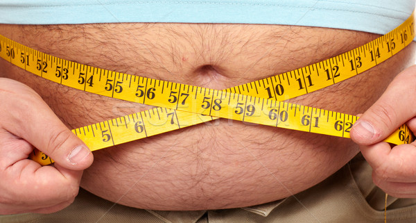 Obesidad grasa obeso hombre abdomen cinta métrica Foto stock © Kurhan