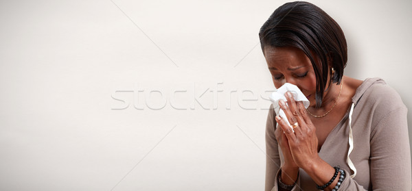 Zwarte vrouwen afro-amerikaanse vrouw blazen neus koud Stockfoto © Kurhan