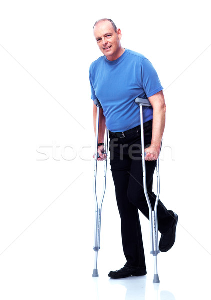 Homem muleta isolado branco médico fundo Foto stock © Kurhan