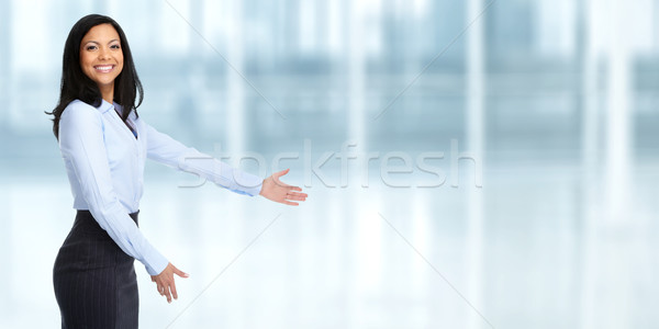 Asian business woman inviting in the office. Stock photo © Kurhan