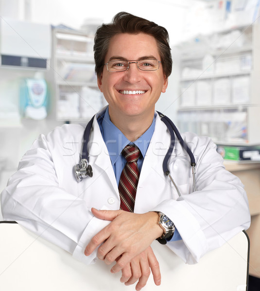 Smiling medical doctor man. Stock photo © Kurhan
