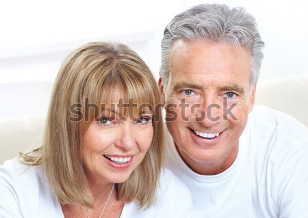 Idős pár mosolyog boldog idős pár szürke Stock fotó © Kurhan