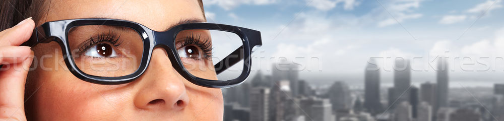 Beautiful woman eyes with eyeglasses. Stock photo © Kurhan