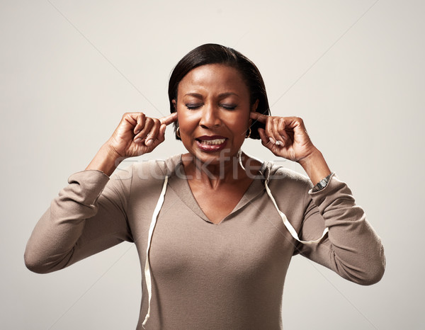 Black woman hearing anything Stock photo © Kurhan