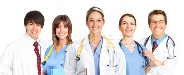 Orvosok nővérek mosolyog orvosi emberek fehér Stock fotó © Kurhan