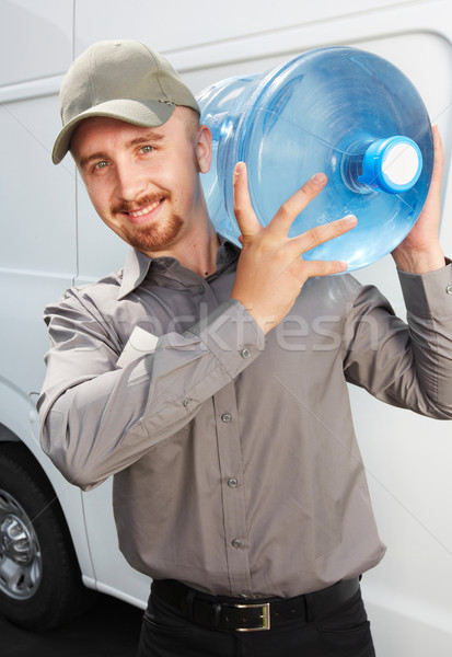 Water levering dienst man fles groot Stockfoto © Kurhan