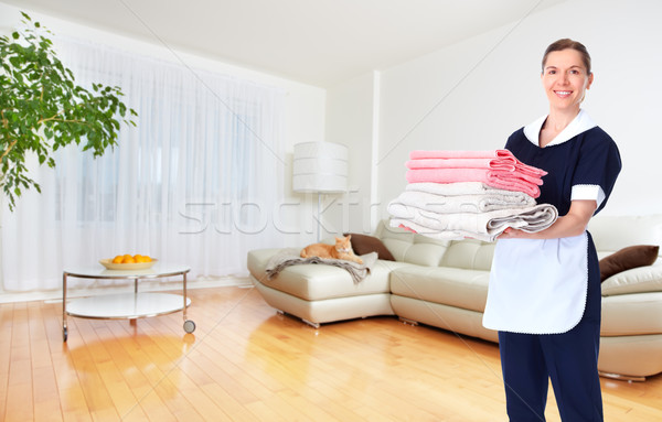 Maid woman with towels. Stock photo © Kurhan