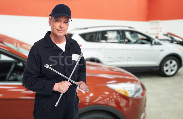 Autójavítás szolgáltatás munkás érett franciakulcs kezek Stock fotó © Kurhan
