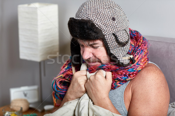 Sick man in bed Stock photo © Kurhan