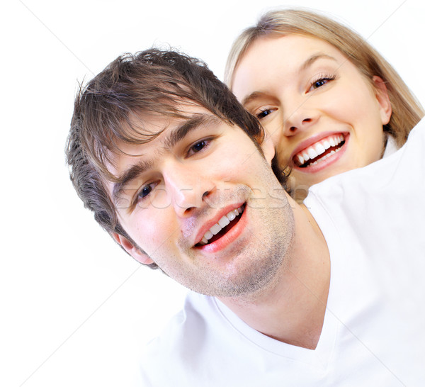 Dragoste fericit zâmbitor cuplu alb Imagine de stoc © Kurhan