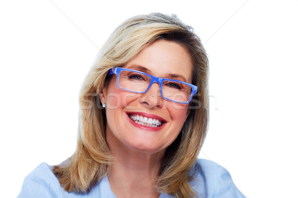 Beautiful elderly lady wearing eyeglasses. Stock photo © Kurhan