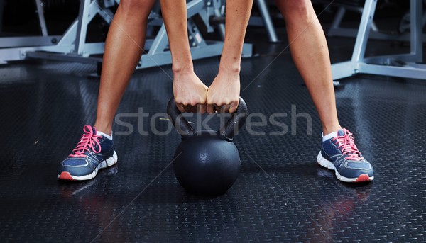 Hands with dumbbell Stock photo © Kurhan