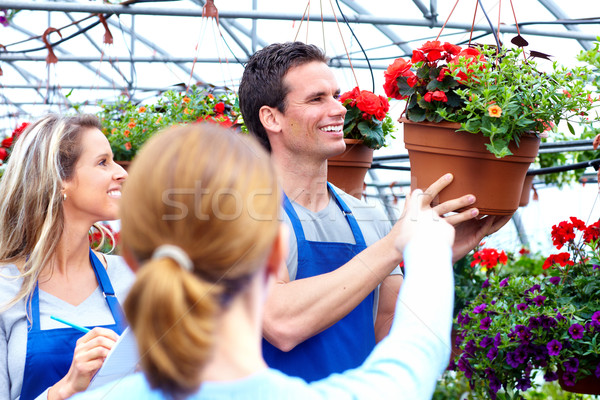 [[stock_photo]]: Femme · achat · fleurs · jardinage · heureux