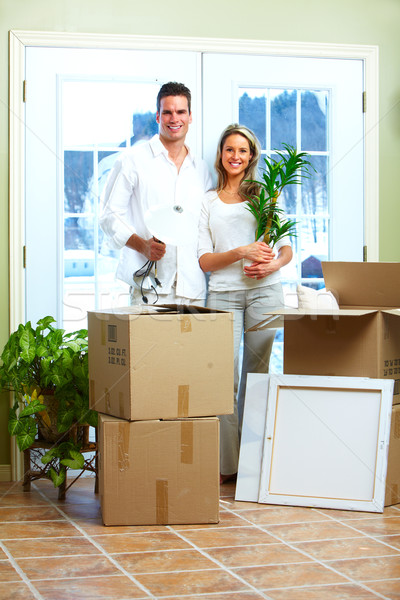 Happy couple moving in a new house. Stock photo © Kurhan