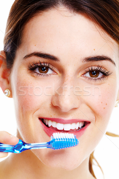 Nő fogmosás fiatal gyönyörű lány fogkefe boldog Stock fotó © Kurhan
