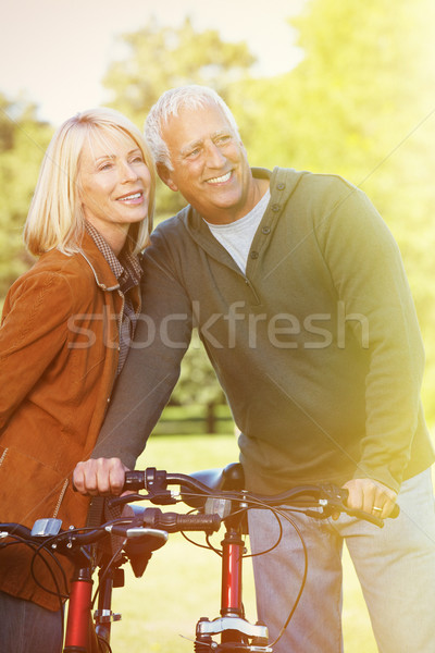 Old people with bycicle Stock photo © Kurhan