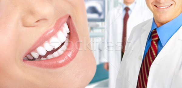 Kobieta zęby piękna kobieta zdrowia tle Zdjęcia stock © Kurhan