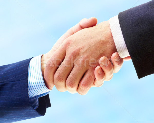 Afaceri strângere de mână oameni de afaceri om de afaceri izolat alb Imagine de stoc © Kurhan