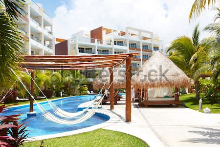 Zwembad hangmat luxe exotisch resort tuin Stockfoto © Kurhan