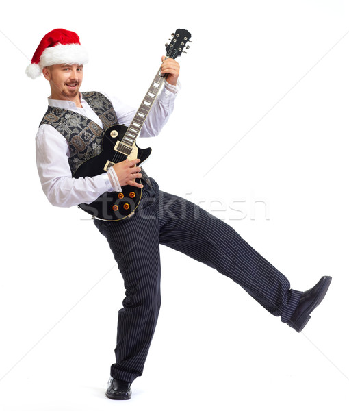 Christmas santa man with electric guitar. Stock photo © Kurhan
