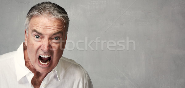 Angry senior man Stock photo © Kurhan