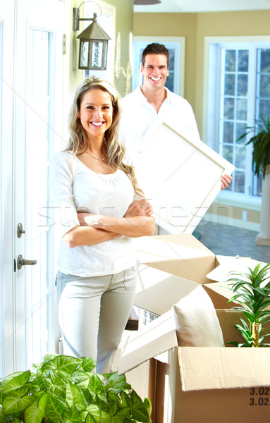 Happy couple moving in a new house. Stock photo © Kurhan