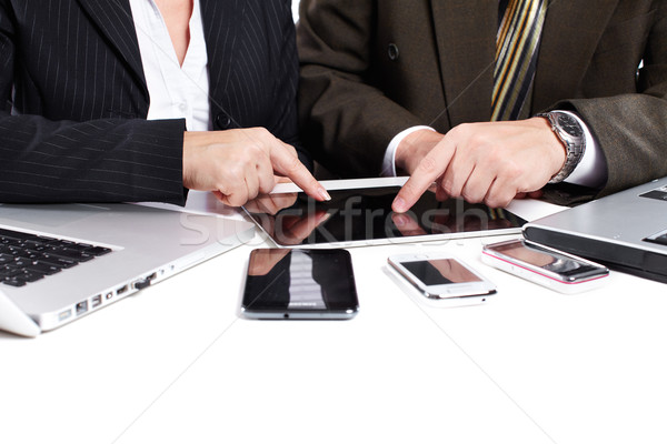 Business people group working with laptop. Stock photo © Kurhan
